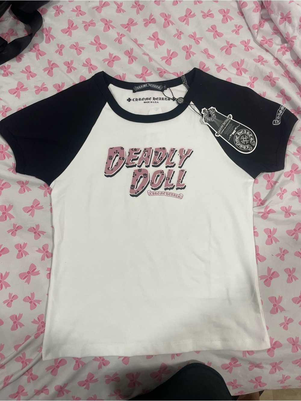 Chrome Hearts White Tee with Black Raglan Sleeves and Pink 'Deadly Doll' Graphic